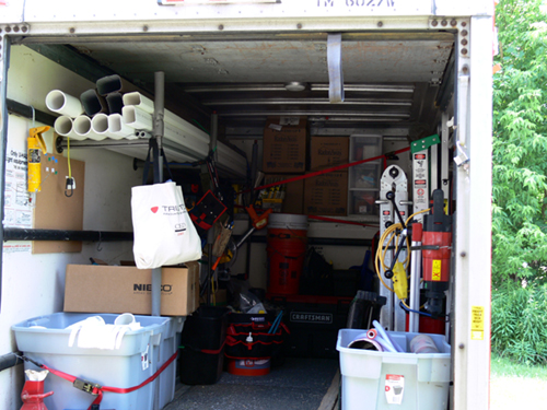Stocked work truck interior.